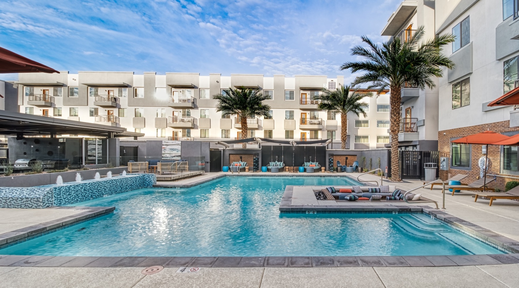 pool with spacious areas and lush landscaping