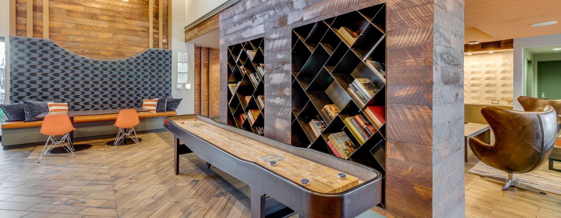 game area with a shuffleboard table